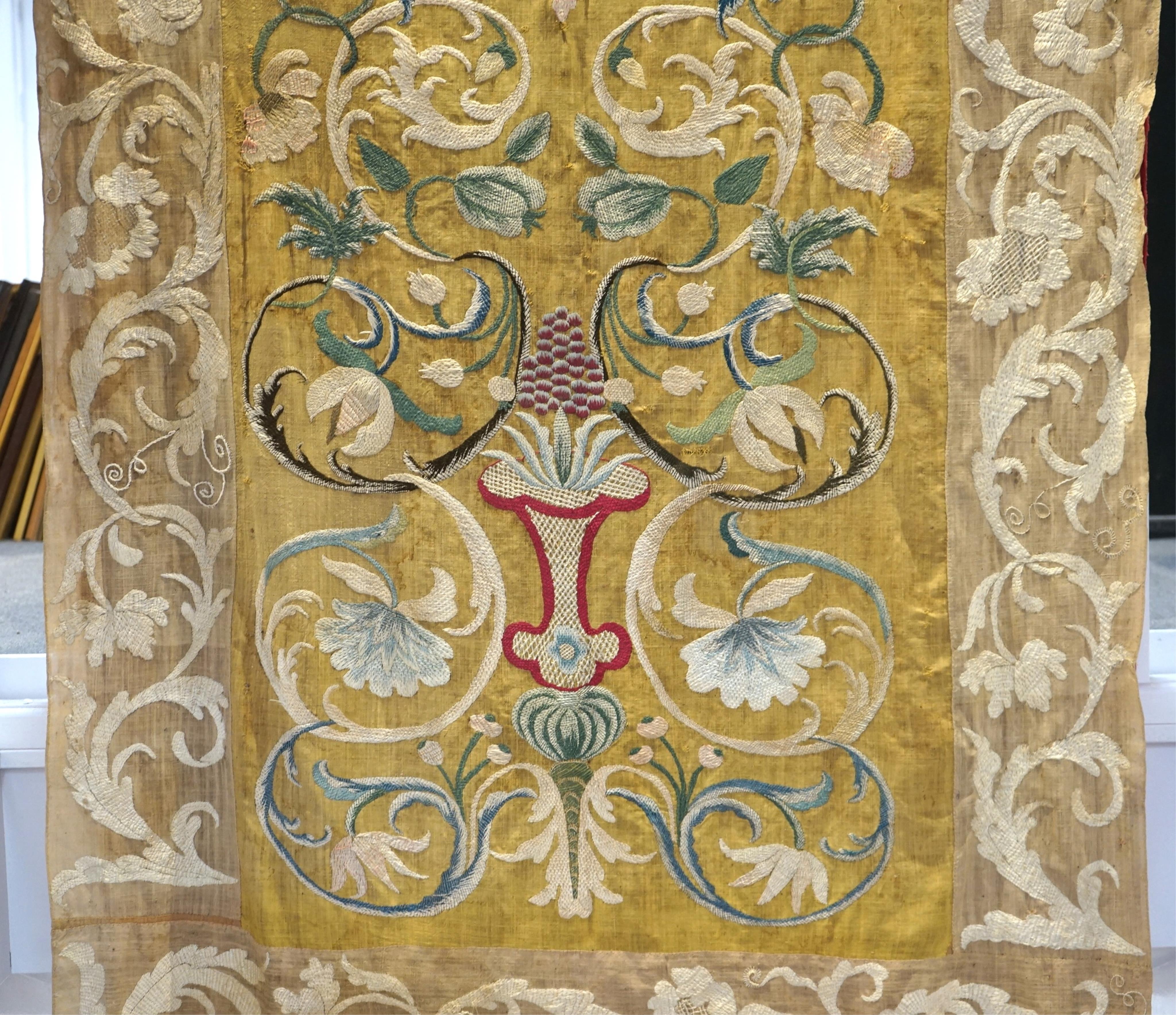 A large pair and one smaller panel of late 18th century Italian silk floss hand embroidered panels, possibly from Florence or Venice, both known for floss embroidery. Thought to be originally sacristy hangings. Elaborate